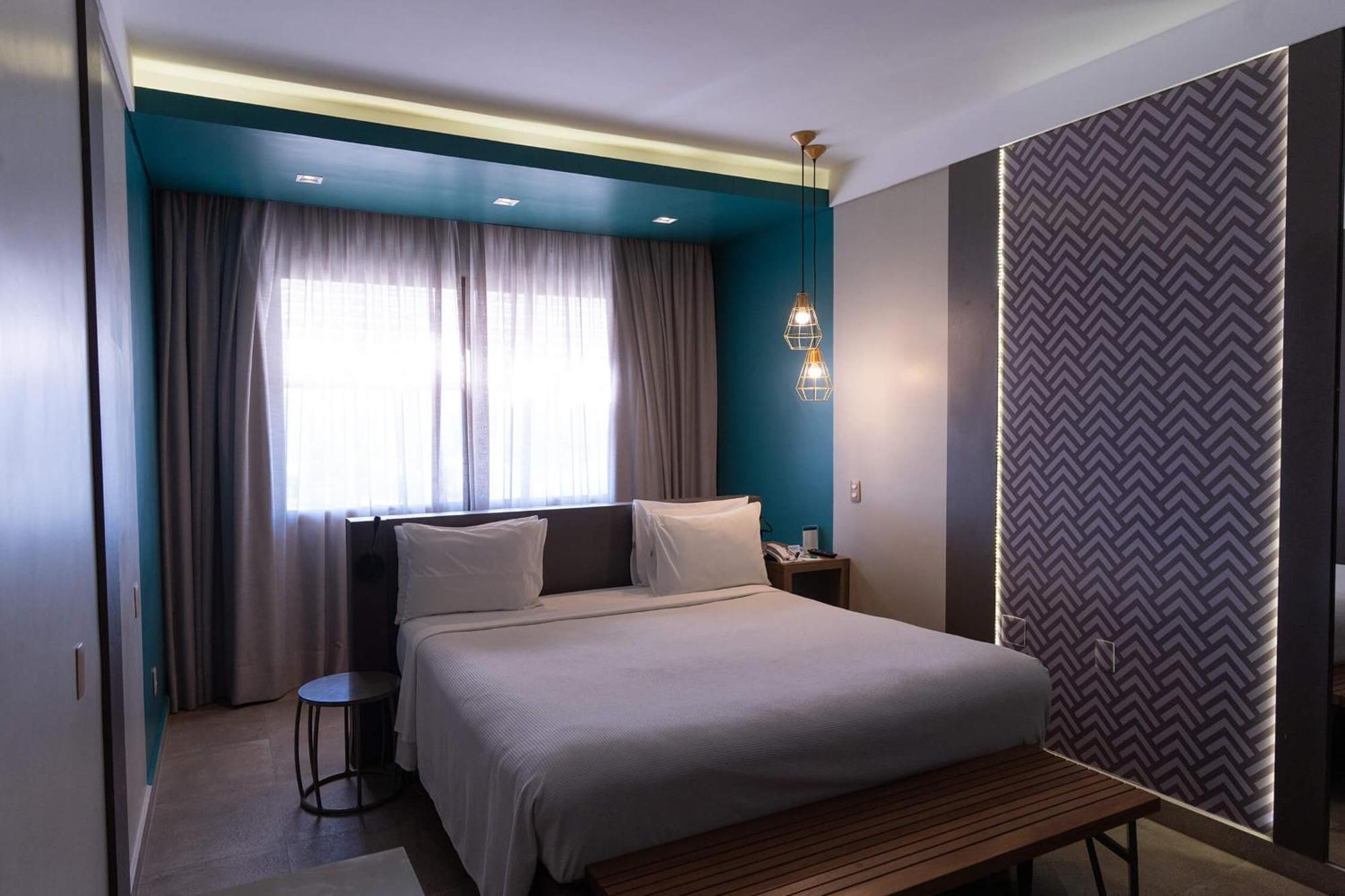 Hotel Deville Prime Cuiaba Exterior foto A bedroom at the hotel